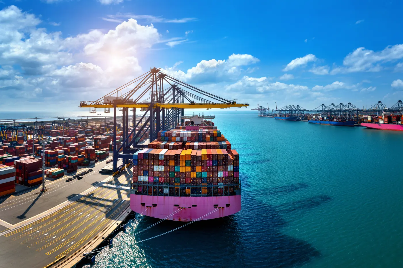 Container ship at a port, importing food products to Canada